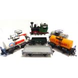 [G SCALE]. AN L.G.B. COLLECTION comprising an 0-4-0 tank locomotive, 2, black, green and red livery;