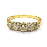 A DIAMOND FIVE STONE 18CT GOLD RING the five graduating round brilliant cut diamonds weighing a