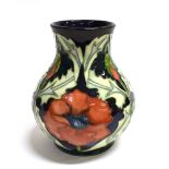 A MOORCROFT POTTERY 'POPPY' PATTERN VASE of ovoid form, designed by Rachel Bishop, impressed and