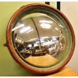 AN UNUSUALLY LARGE TEAK FRAMED CONVEX MIRROR 68cm diameter overall