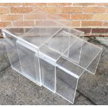 A NEST OF THREE PERSPEX COFFEE TABLES the largest 41cm wide 33cm deep 40cm high
