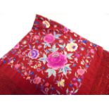 A CHINESE FLORAL EMBROIDERED FRINGED SILK SHAWL approximately 200cm x 200cm (inclusive of