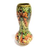 A LARGE MOORCROFT POTTERY 'FLAME OF THE FOREST' PATTERN VASE of waisted form, designed by Philip