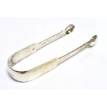 A PAIR OF WILLIAM IV SILVER SUGAR TONGS plain fiddle pattern design, hallmarked 1837, B date later