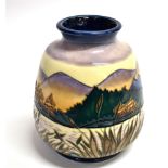 A LIMITED EDITION MOORCROFT POTTERY VASE IN THE 'SPIRIT OF THE LAKES' PATTERN commemorating the