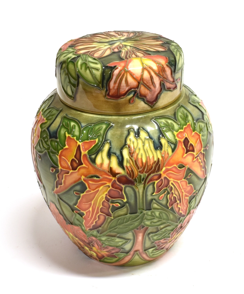 A LARGE MOORCROFT POTTERY 'FLAME OF THE FOREST' PATTERN GINGER JAR AND COVER designed by Philip