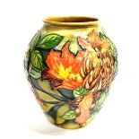 A LARGE MOORCROFT POTTERY 'FLAME OF THE FOREST' PATTERN VASE designed by Philip Gibson, impressed