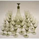 A 1960S DECANTER AND SUITE OF GLASSES the decanter and stopper 29cm high, together with six