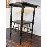 A VICTORIAN AESTHETIC MOVEMENT EBONISED OCCASIONAL TABLE with gilt highlights, in the manner of E