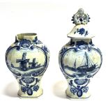 A PAIR OF VILLEROY AND BOCH, METTLACH VASES painted in Delft style with reserves of windmills and