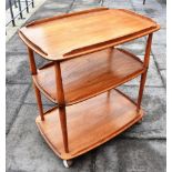 AN ERCOL 'GOLDEN DAWN' THREE TIER TROLLEY 72cm x 46cm, 77cm high