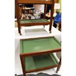 TWO 1970S MAHOGANY FRAMED TWO TIER TROLLEYS each with lift-out green plastic trays 75cm x 40cm,