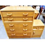 A LIGHT OAK G-PLAN 'BRANDON' CHEST OF FIVE DRAWERS 77cm wide 46cm deep 97cm high; together with a
