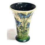 A MOORCROFT POTTERY TRUMPET SHAPED VASE DECORATED IN THE 'LOVE IN A MIST' PATTERN, impressed and