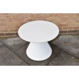 A CIRCULAR RETRO OCCASIONAL TABLE the circular top 61cm diameter, on circular spreading fibreglass