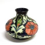 A MOORCROFT POTTERY 'POPPY' PATTERN VASE of squat ovoid form, designed by Rachel Bishop, impressed