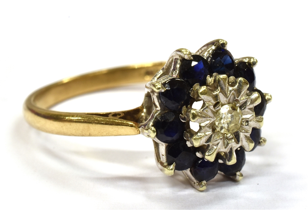 A 9CT GOLD DIAMOND AND SAPPHIRE CLUSTER RING the centre illusion set small diamond with sapphire - Image 2 of 3