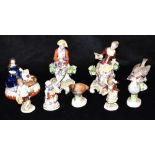A GROUP OF CERAMICS INCLUDING PAIR OF ROCOCO STYLE FIGURES of a lady and gentleman, bearing Derby