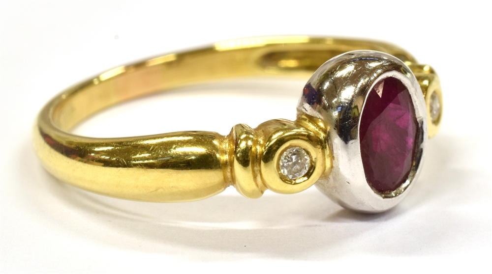 A RUBY AND DIAMOND THREE STONE 18CT GOLD RING the oval cut ruby approx. 7 x 5mm, with two small - Image 2 of 3
