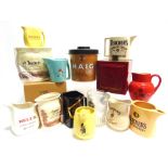 BREWERIANA - ASSORTED Ten whisky-branded pottery water jugs, including a Carlton Ware Haig