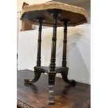 A VICTORIAN EBONISED AND GILT GYPSY TABLE the octagonal top 55cm wide, 64cm high
