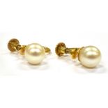 A PAIR OF 9CT GOLD CULTURED PEARL SCREW BACK EARRINGS the single cultured pearls approx. 7mm