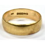 A 9CT GOLD PLAIN WEDDING BAND of D profile, 6mm wide, ring size O, weighing approx. 3.0 grams