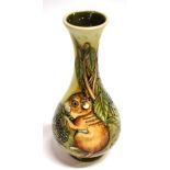 A MOORCROFT POTTERY VASE WITH TUBELINED DECORATION of two mice and blackberries, dated 2004 and