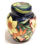 A MOORCROFT POTTERY GINGER JAR AND COVER DECORATED IN THE 'GOLDEN JUBILEE' PATTERN designed by