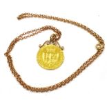 A GEORGE III GOLD GUINEA PENDANT on a long chain, the gold guinea dated 1788 with soldered, scroll