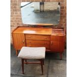 AN AUSTINSUITE RETRO DRESSING TABLE with sliding tambour compartment to top right, three central