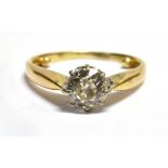 A 0.75 CARAT DIAMOND SOLITAIRE GOLD RING the round old brilliant cut diamond, assessed colour H/I,