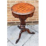 A VICTORIAN ROSEWOOD TRUMPET SHAPED WORK TABLE the circular top inset with parquetry chess board,