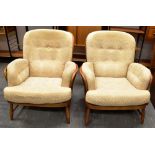 A PAIR OF ERCOL 'JUBILEE' ARMCHAIRS in 'Golden Dawn' colour, with cream coloured upholstery