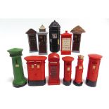 A COLLECTION OF CAST RESIN BRITISH TELEPHONE BOXES the largest 11cm high, (11).