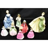 FIVE ROYAL DOULTON FIGURES: HN2335 'Hilary', HN2398 'Alexandra', HN3697 'Home at Last', HN2338 '