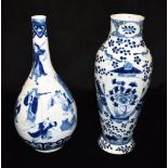 A CHINESE BOTTLE VASE of ovoid form with flared neck, underglaze blue painted decoration of scholars