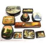 A GROUP OF TEN RUSSIAN LACQUERED BOXES some with mother-of-pearl decoration, including a pen case