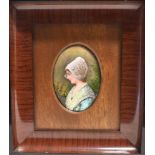 ALEXANDRE SOUSTRE: A LIMOGES OVAL ENAMEL PLAQUE depicting a young girl wearing a bonnet, signed '