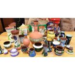 ASSORTED DEVONWARE AND OTHER CERAMICS including six spill vases of waisted cylindrical form, 18cm