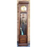 A CONTINENTAL OAK CASED LONGCASE CLOCK the brass coloured dial with Arabic Art Nouveau style hour