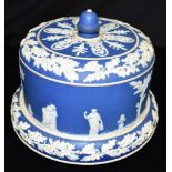 A VICTORIAN JASPERWARE CHEESE DISH AND COVER with sprigged decoration of Classical figures, 26.5cm
