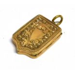 A VICTORIAN SHIELD SHAPED LOCKET Floral decoration with shield shaped cartouche unmarked assessed as