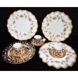 ROYAL CROWN DERBY: three Imari palette coffee cans and saucers, and three floral decorated plates