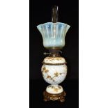 A LATE VICTORIAN OIL LAMP with frilled vaseline glass shade, Messengers Patent burner, satin