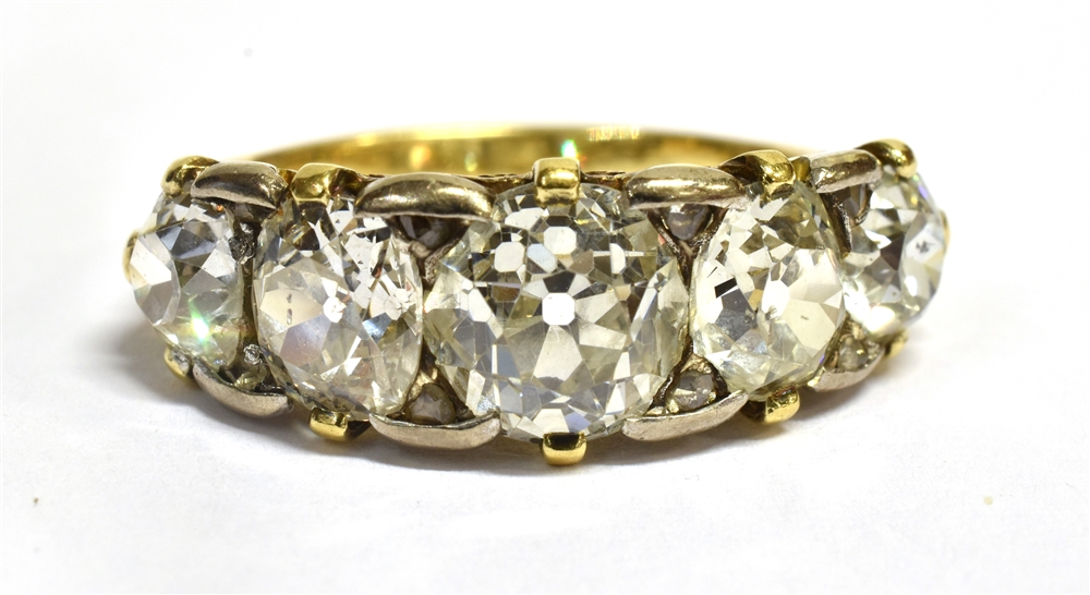 A 5 CARAT LATE VICTORIAN/EDWARDIAN FIVE STONE RING the round/off round old cut diamonds graduating - Image 2 of 4