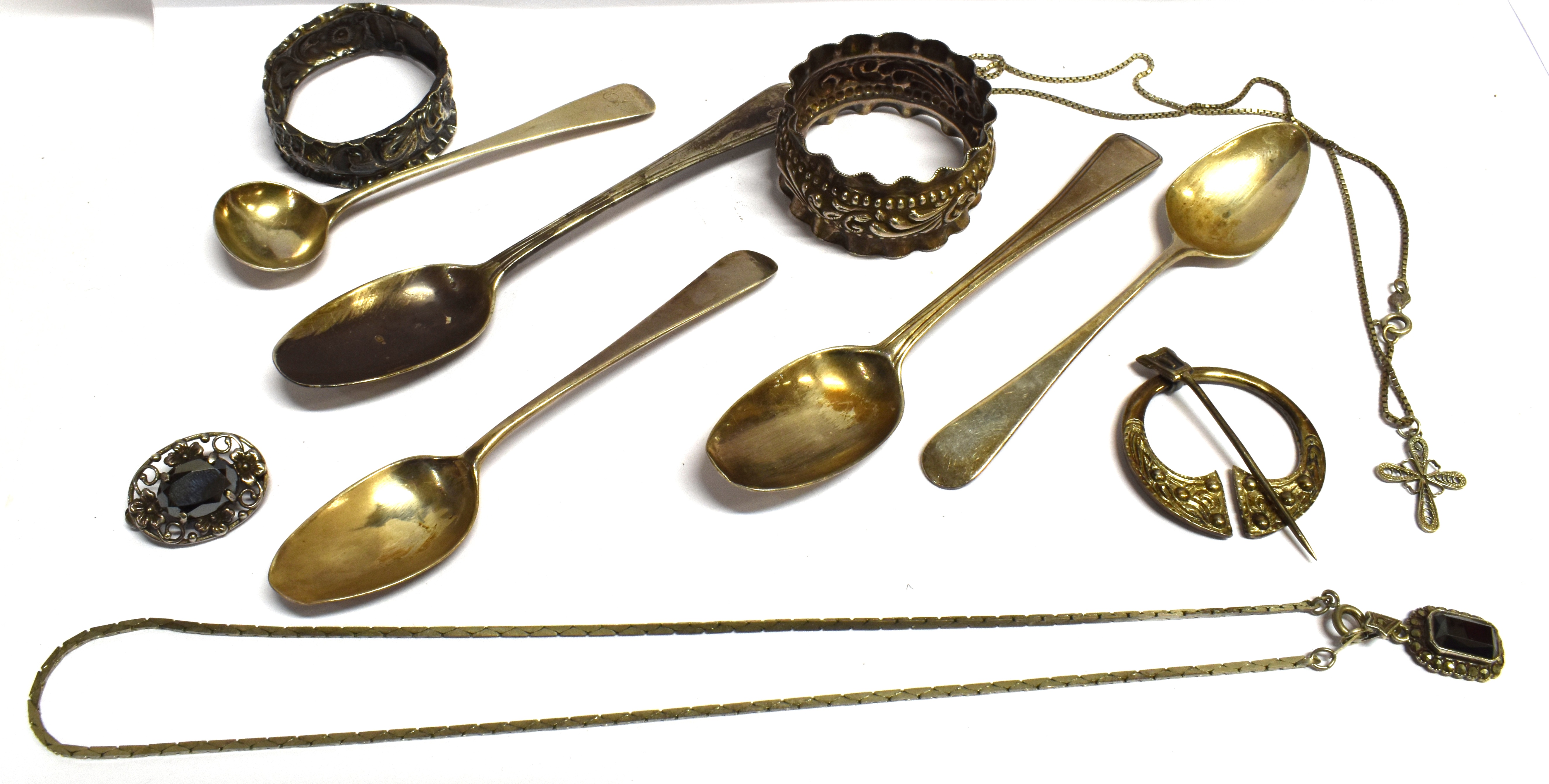 FOUR ITEMS OF SILVER JEWELLERY Comprising two pendants with chains, a stone set brooch and a