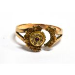 A VICTORIAN 15CT GOLD CLUSTER RING A/F the target style cluster set with a tiny ruby and tiny