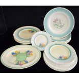 SIX SUSIE COOPER DINNER PLATES 25cm diameter; and a group of Clarice Cliff 'Crocus' plates: an