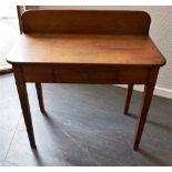 A 19TH CENTURY OAK SIDE TABLE fitted with a single short drawer, raised on square supports, 90cm